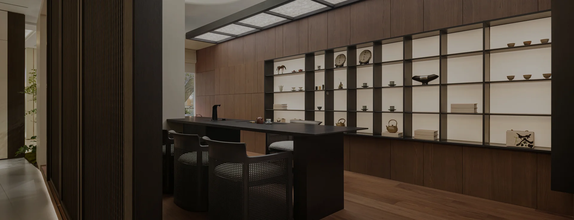 Premium bespoke living space featuring integrated cabinetry and warm architectural lighting