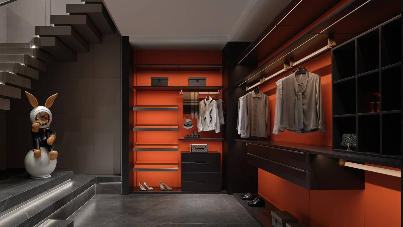 Bespoke built-in wardrobe with refined wood veneer panels and tailored interior fittings